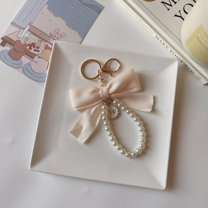 Elegant Pearl Bow Bag Charm